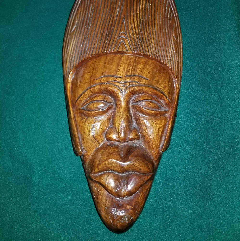 Carved wooden face